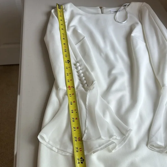Elegant Calvin Klein White Dress with Flared Sleeves. - Picture 9 of 15